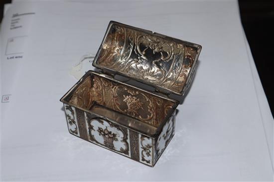 An Edwardian silver and white enamel miniature casket by Harold Child, London, 1904, 80mm.